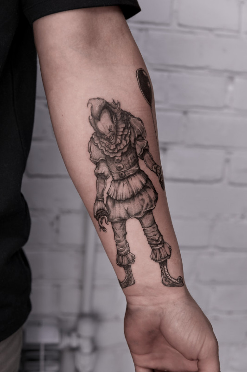 Arm clown jester, photo - Tattoo Master Barb Tattoo