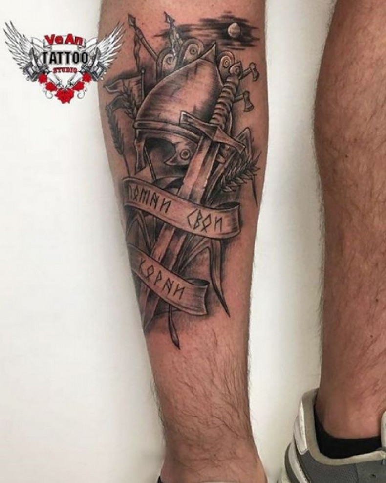 Black and grey sword leg, photo - Tattoo Master Barb Tattoo