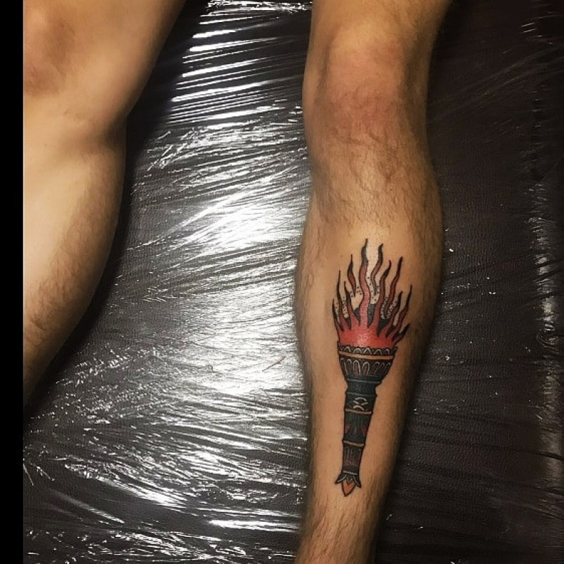 Leg old school torch, photo - Tattoo Master Barb Tattoo