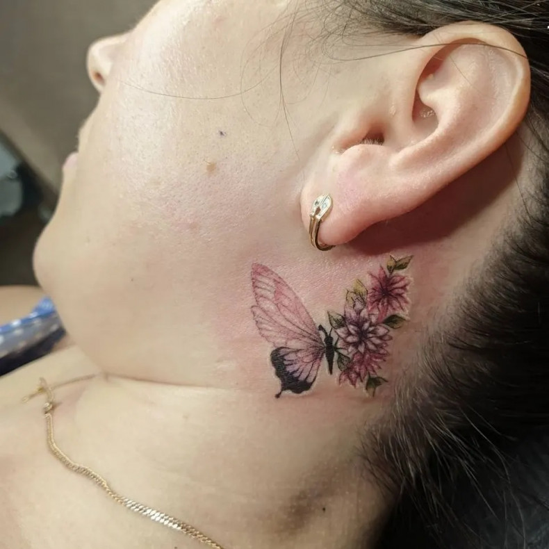 Butterfly behind the ear neck, photo - Tattoo Master Barb Tattoo