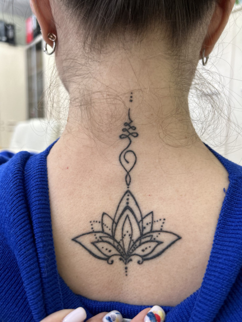 Unalome lotus flower neck, photo - Tattoo Master Barb Tattoo