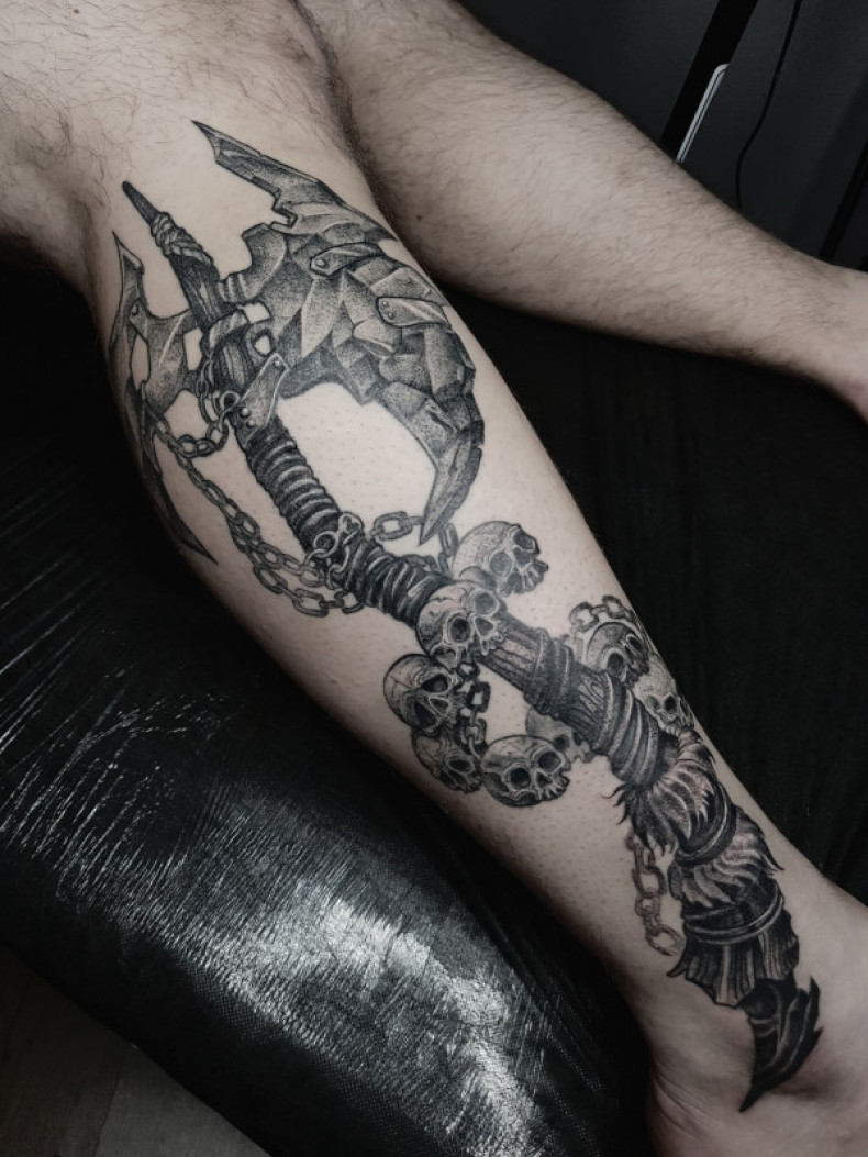 Axe chain skull, photo - Tattoo Master Barb Tattoo