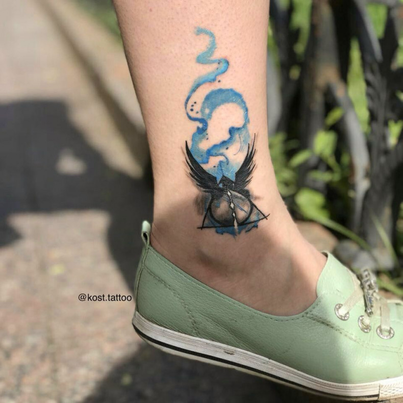 Watercolor deathly hallows wings, photo - Tattoo Master Barb Tattoo