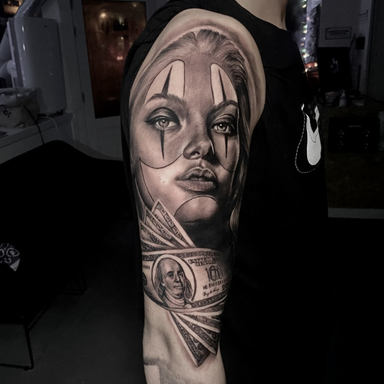 Black and grey woman face dollar sign, photo - Tattoo Master Barb Tattoo