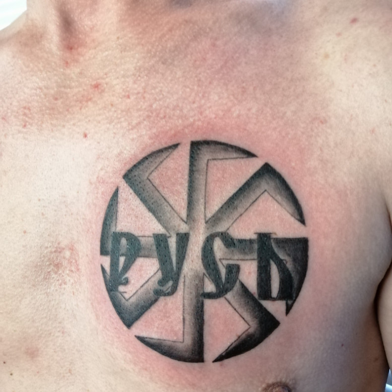 Schwarzgrau Symbol kolovrat, photo - Tattoo-Meister Barb Tattoo