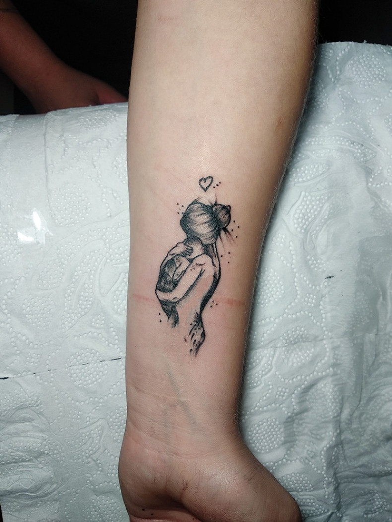 Mother mother and child, photo - Tattoo Master Barb Tattoo