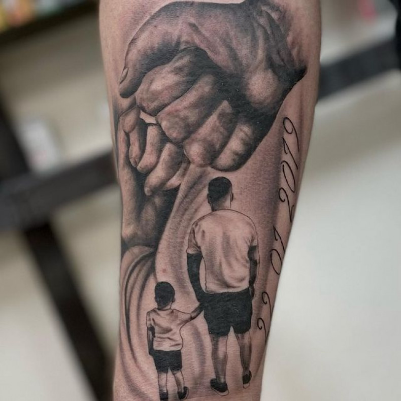 Black and grey father son child, photo - Tattoo Master Barb Tattoo