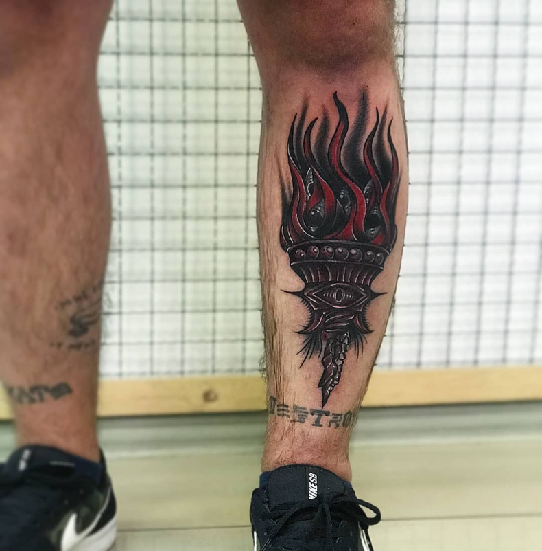 Calf old school torch, photo - Tattoo Master Barb Tattoo