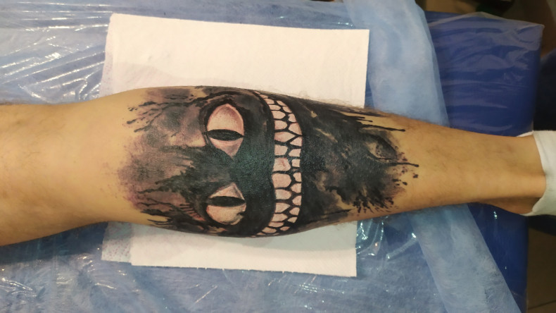 Calf Cheshire Cat, photo - Tattoo Master Barb Tattoo