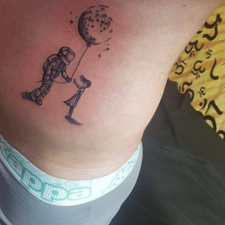 Ein Astronaut luftballon astronaut, photo - Tattoo-Meister Barb Tattoo