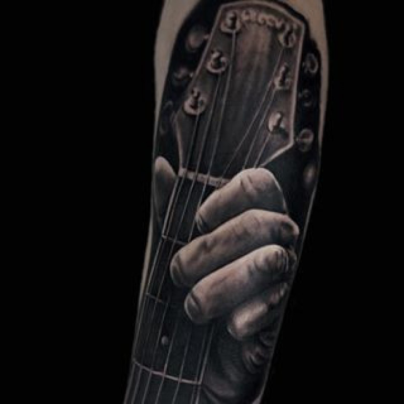 Black and grey guitar, photo - Tattoo Master Barb Tattoo