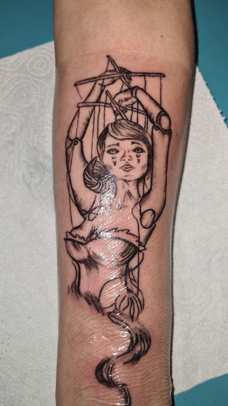 Puppeteer, photo - Tattoo Master Barb Tattoo