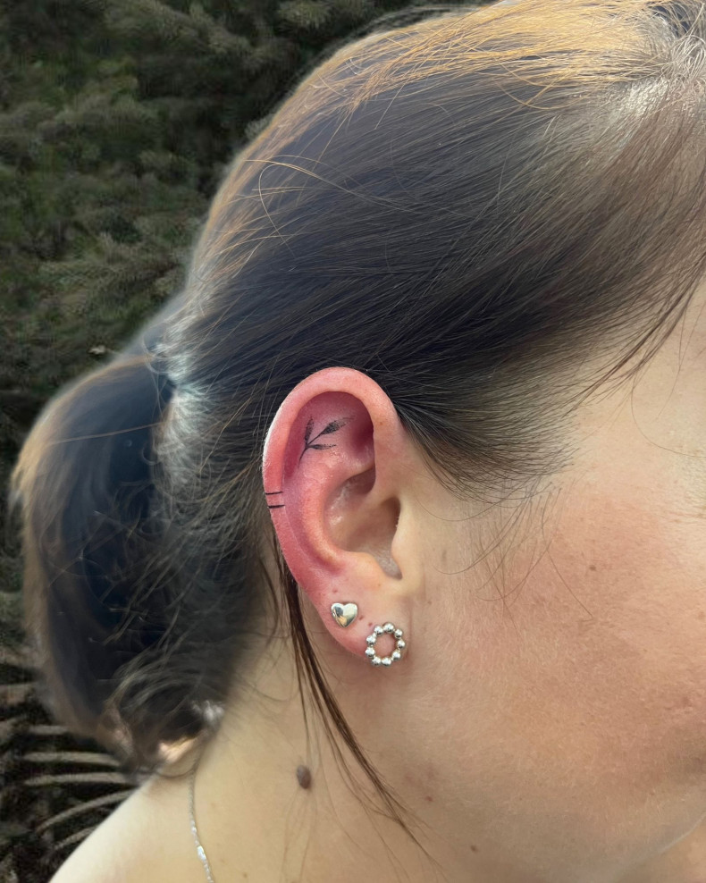 Women twig ear, photo - Tattoo Studio Crystal Tattoo