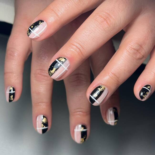 Black and White Nails with Gold Decoration