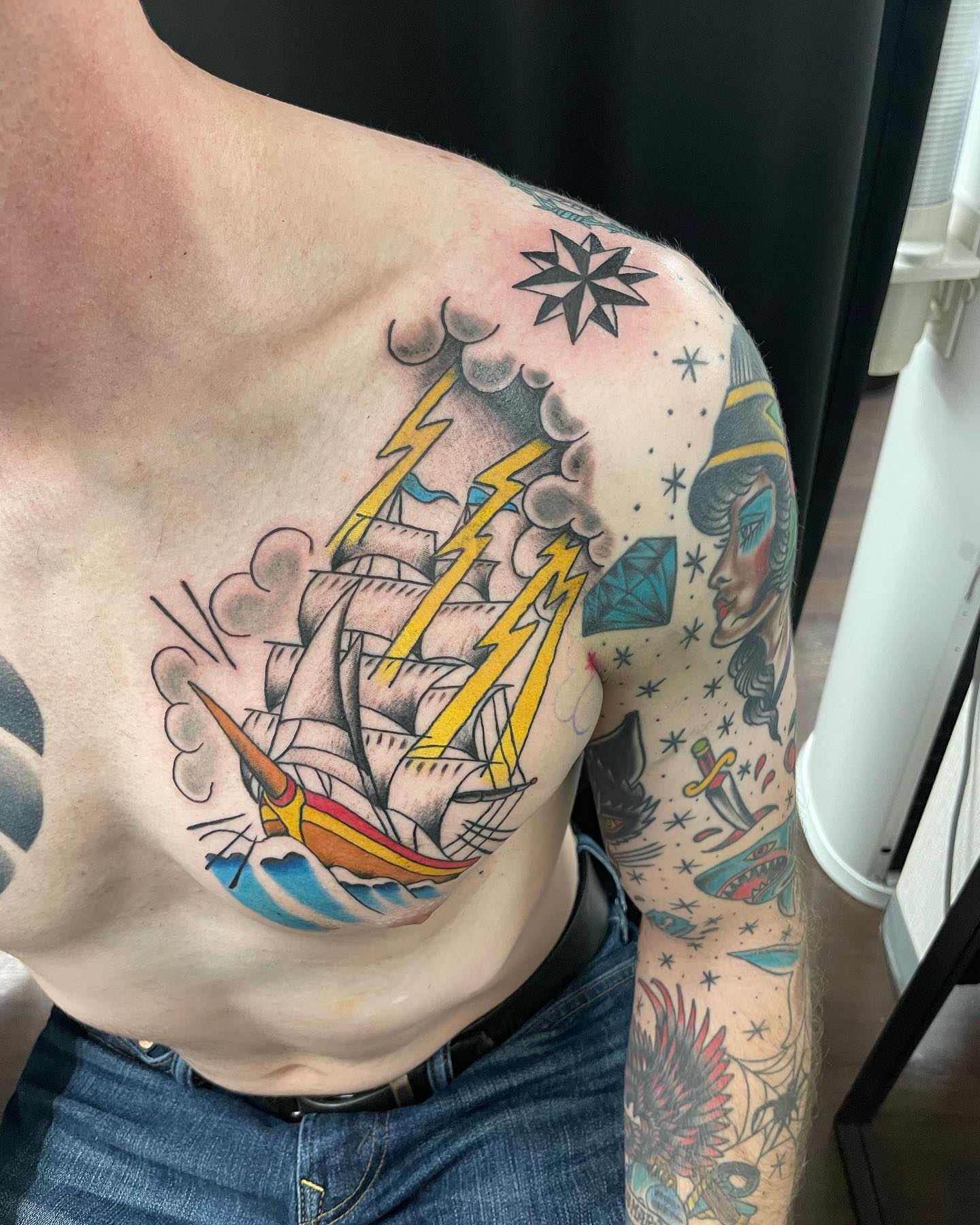 Ship Chest and Sleeve Tattoo