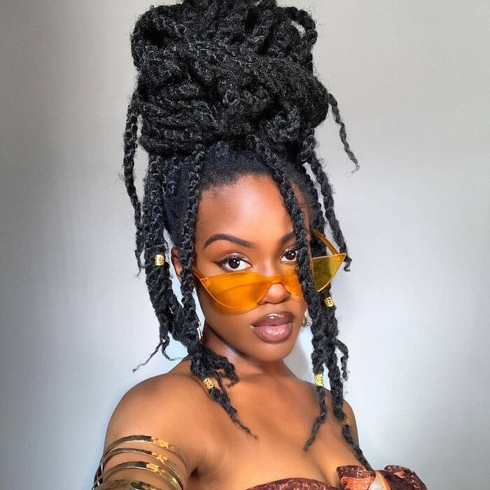 Photo of woman with Natural Kinky Twists