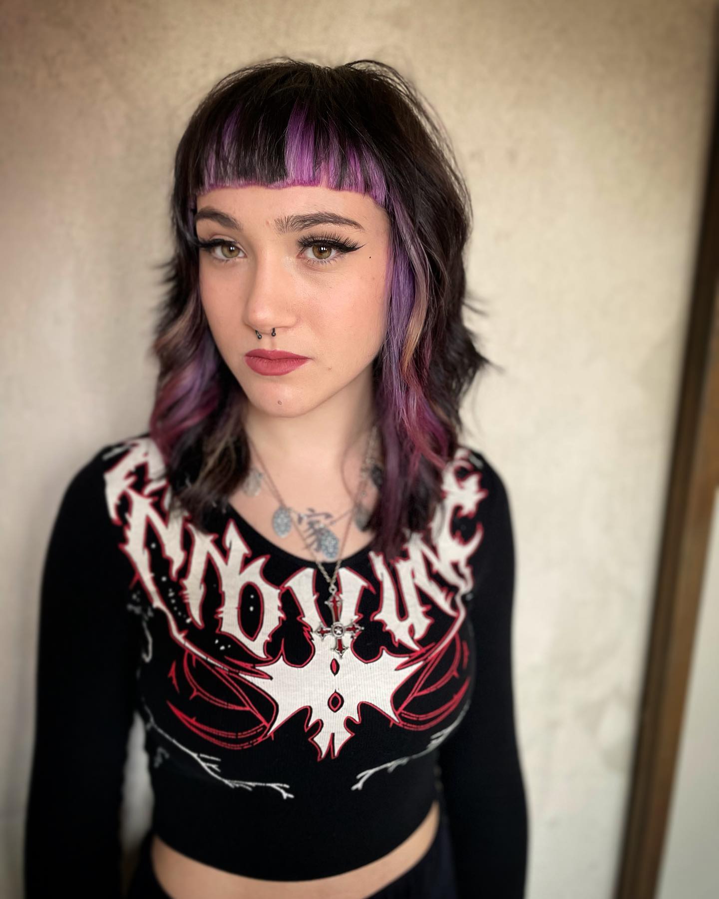Wolf Haircut with Purple Highlights