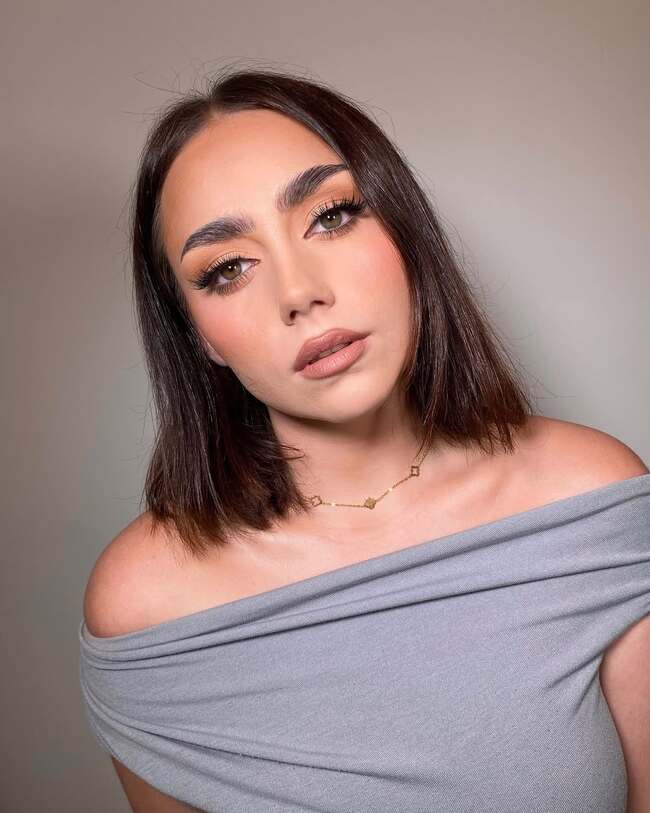 Nude makeup with warm eyeshadow tones and soft blush blending