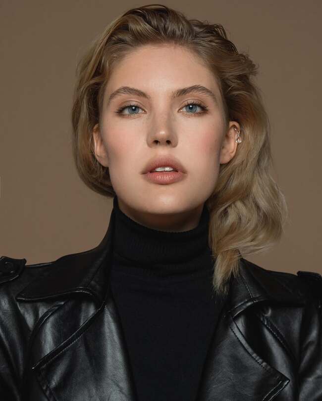 Nude makeup with matte lipstick and natural skin tone