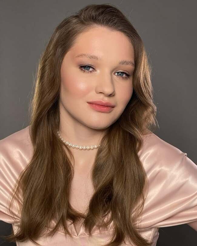 Nude makeup with pearl luminosity and sleek styling