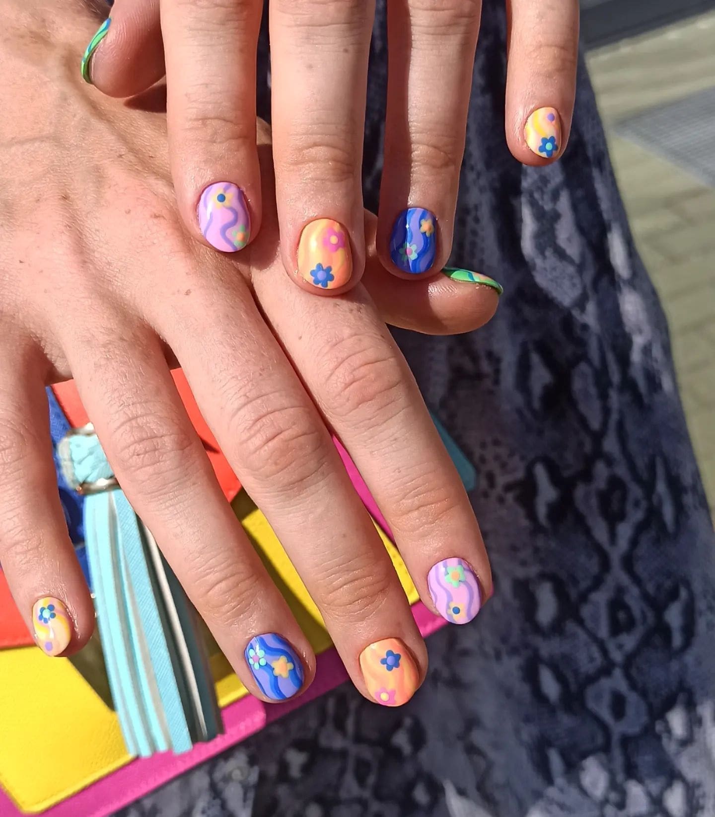 Multicolored nails with flowers