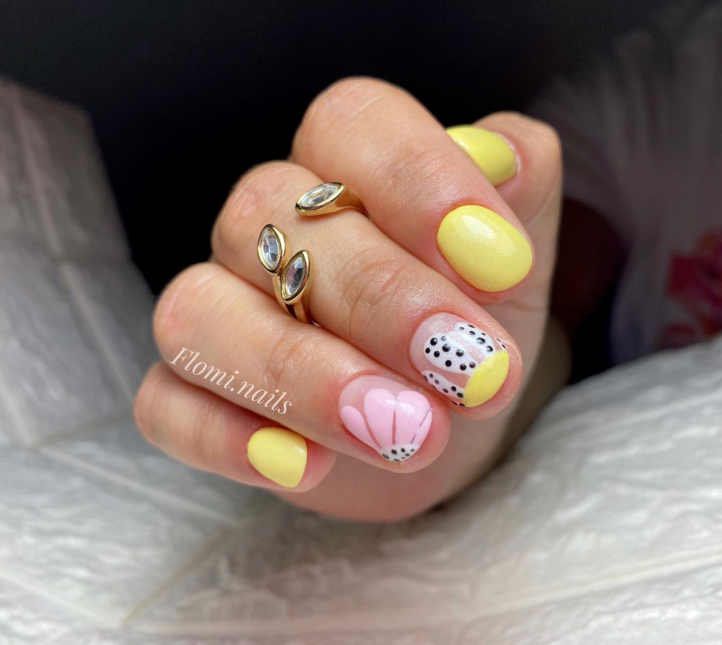 Yellow, pink and white nails