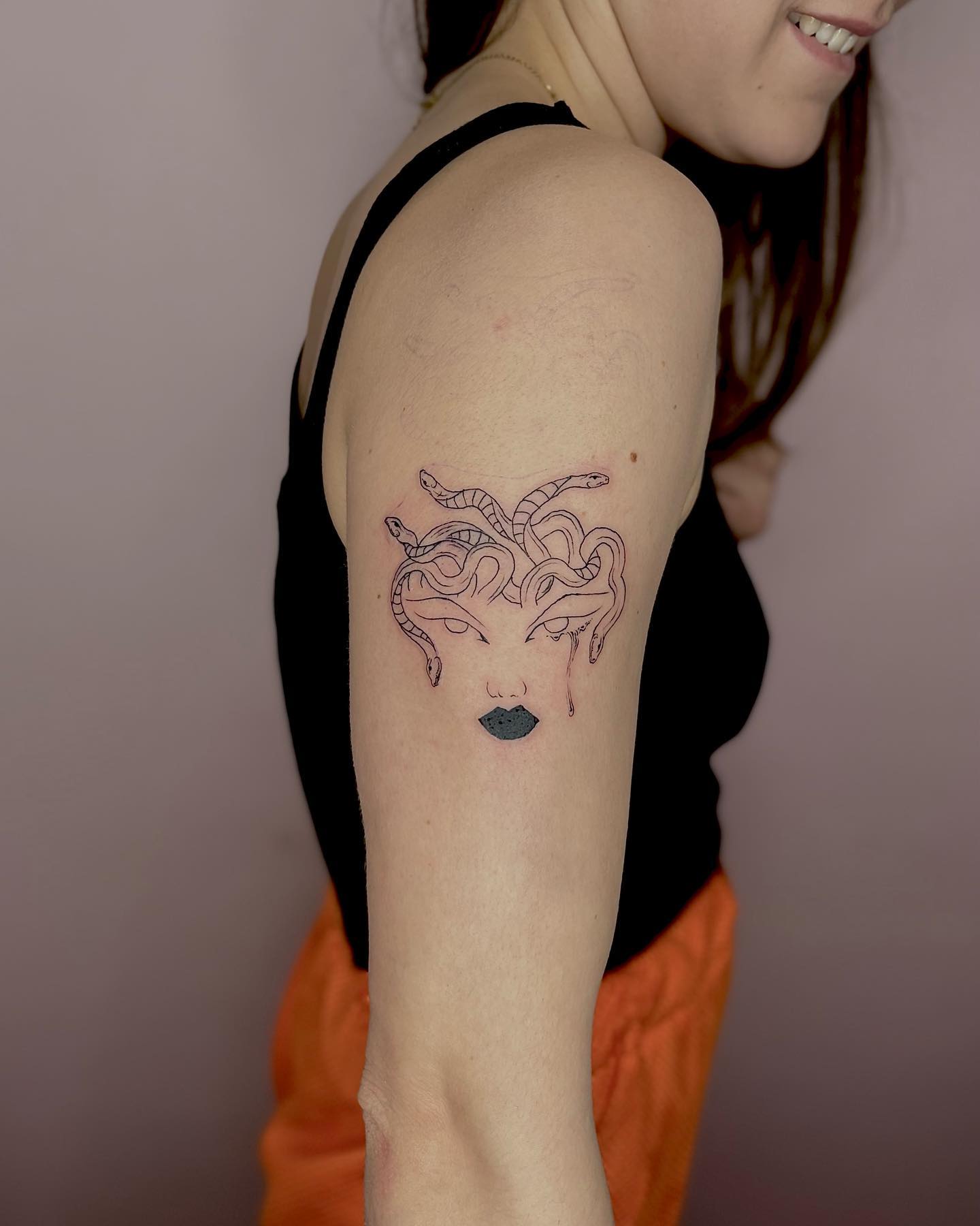 Tiny Medusa Tattoo 