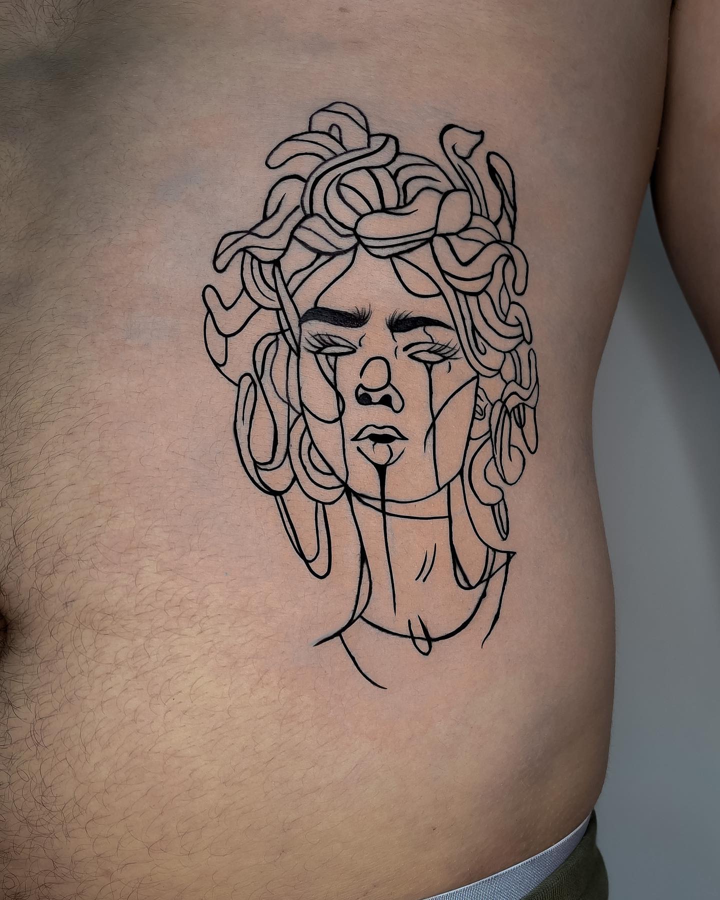 Weinendes Medusa-Tattoo