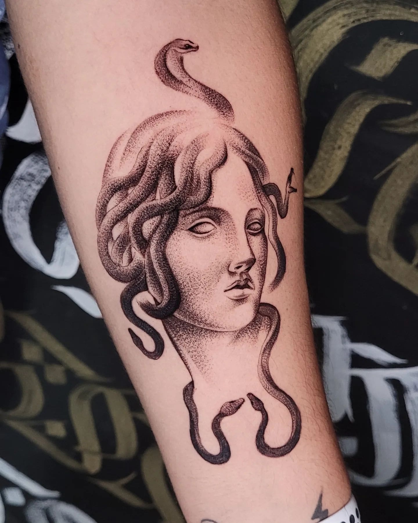 Realistic Statue of Medusa Tattoo 