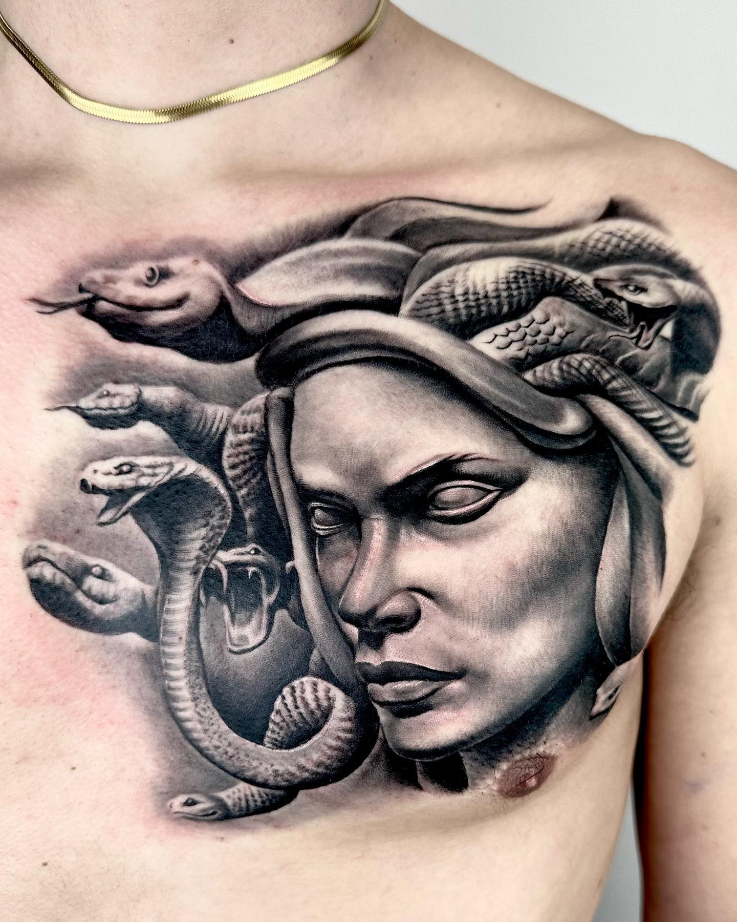 Medusa Statue Tattoo on Chest