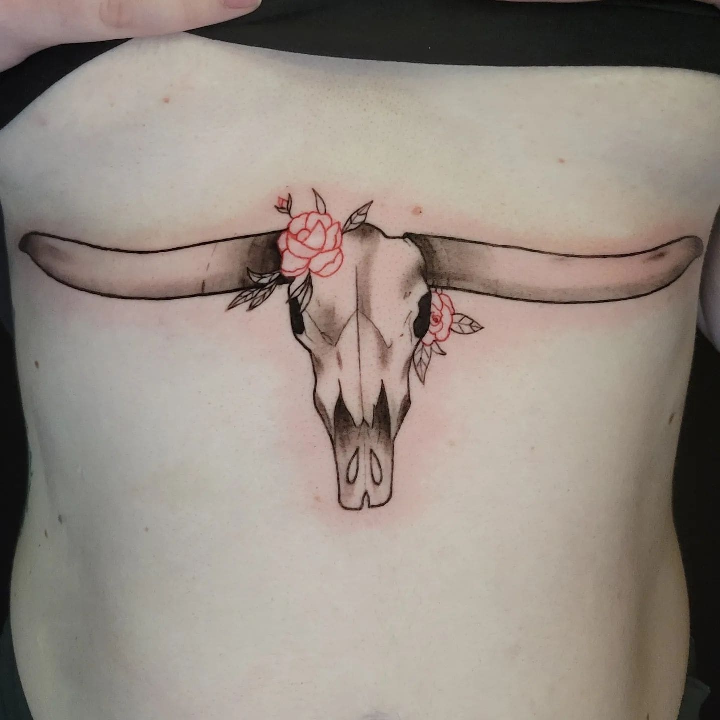 Tatuaż mostka czaszki byka