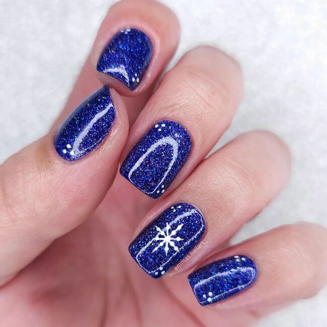 Glittering Midnight Sky nail design