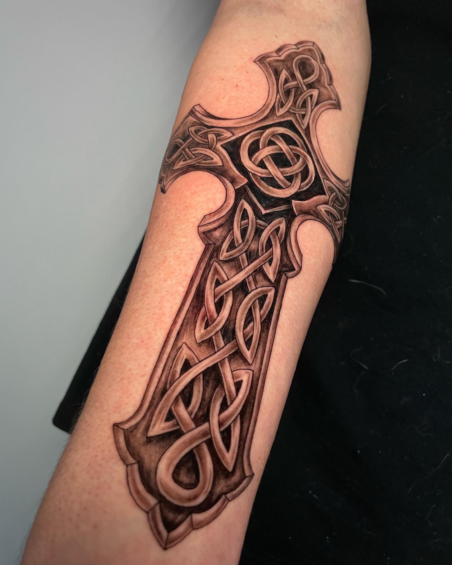 religious arm tattoos for men