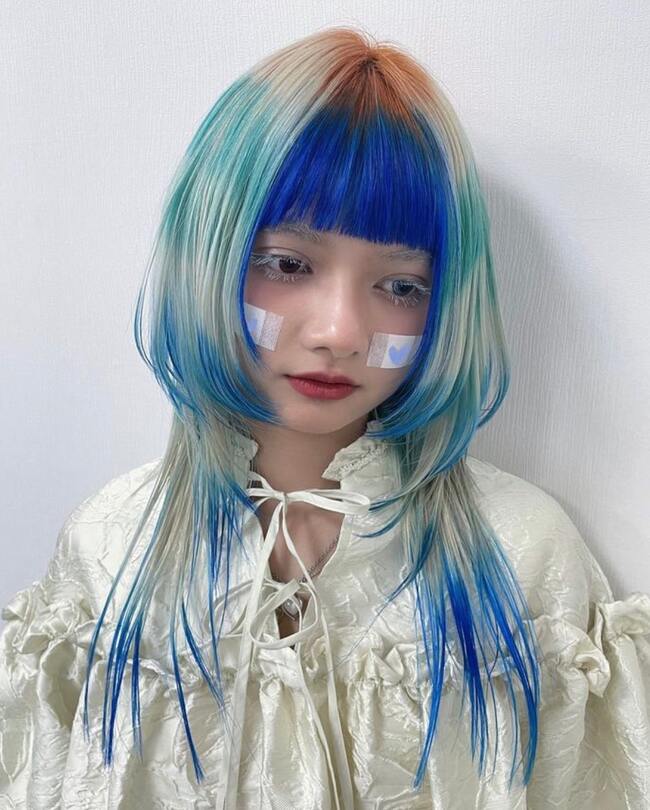 White Jellyfish bob haircut with blue bangs 