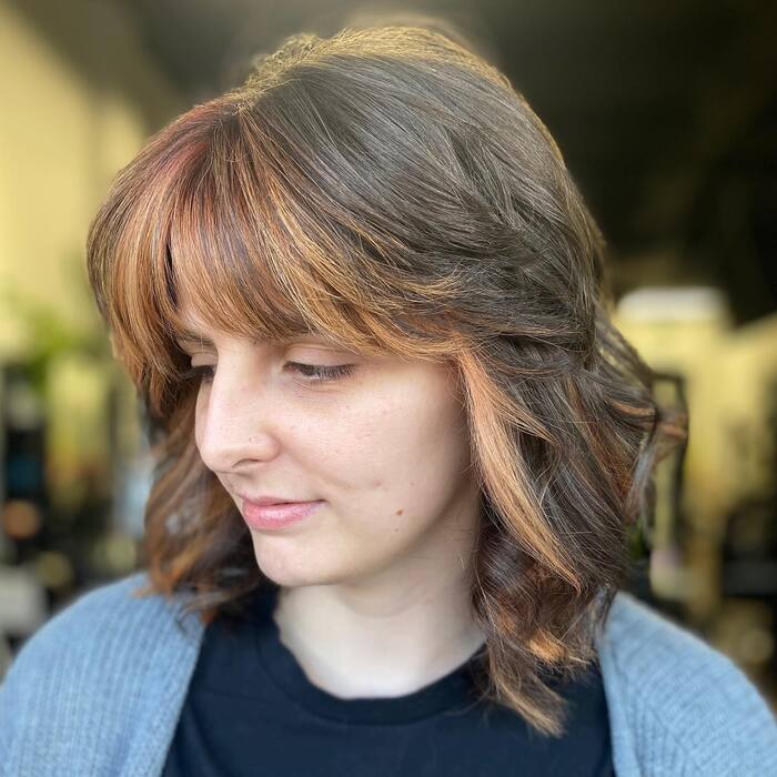 Short butterfly cut with bangs