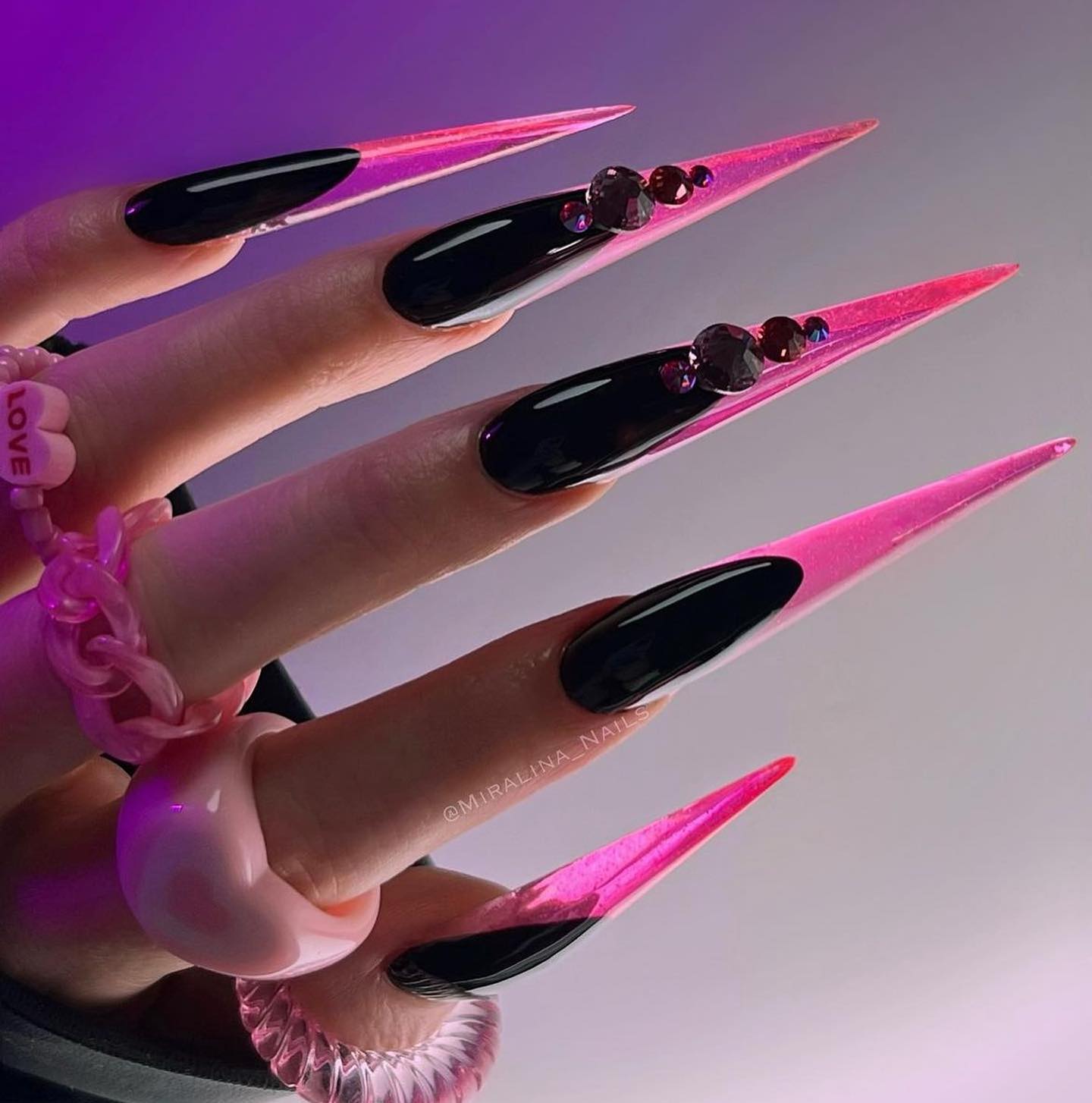 Pink stiletto goth nails