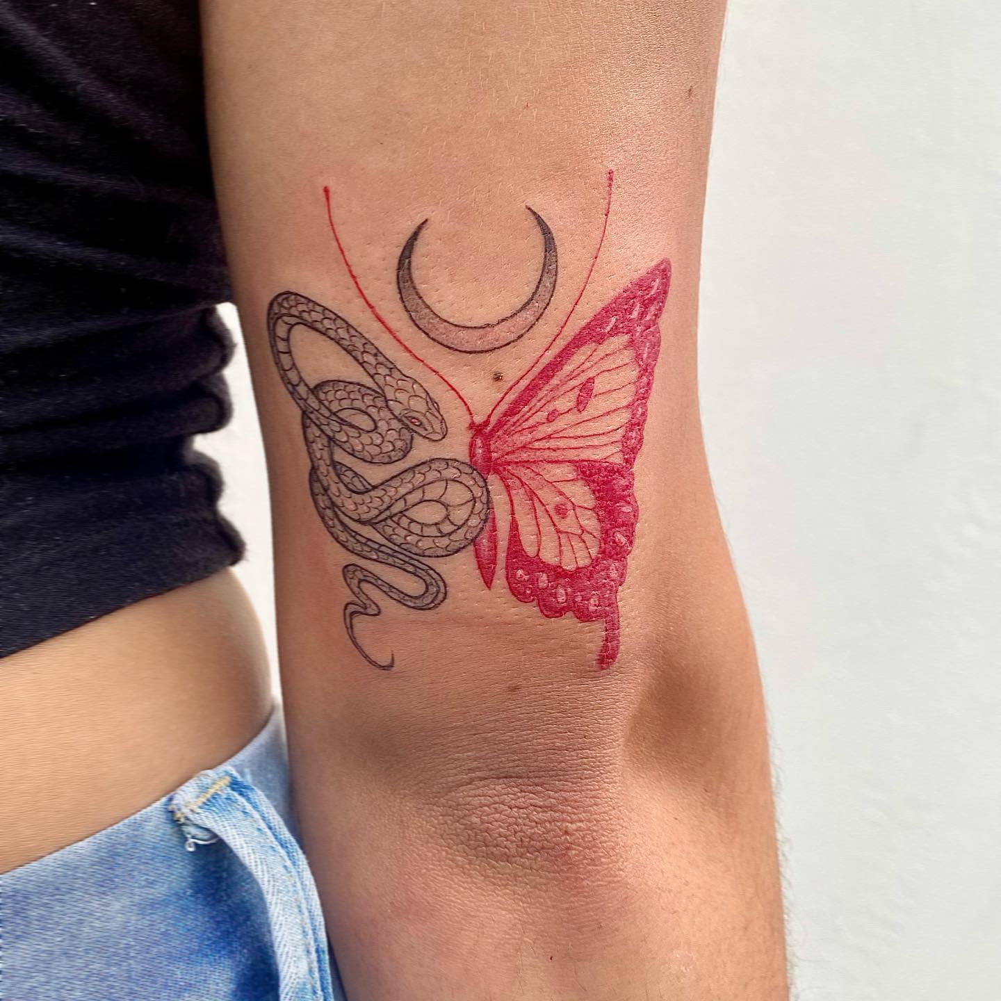 Butterfly Tattoo on Black Skin with symbol