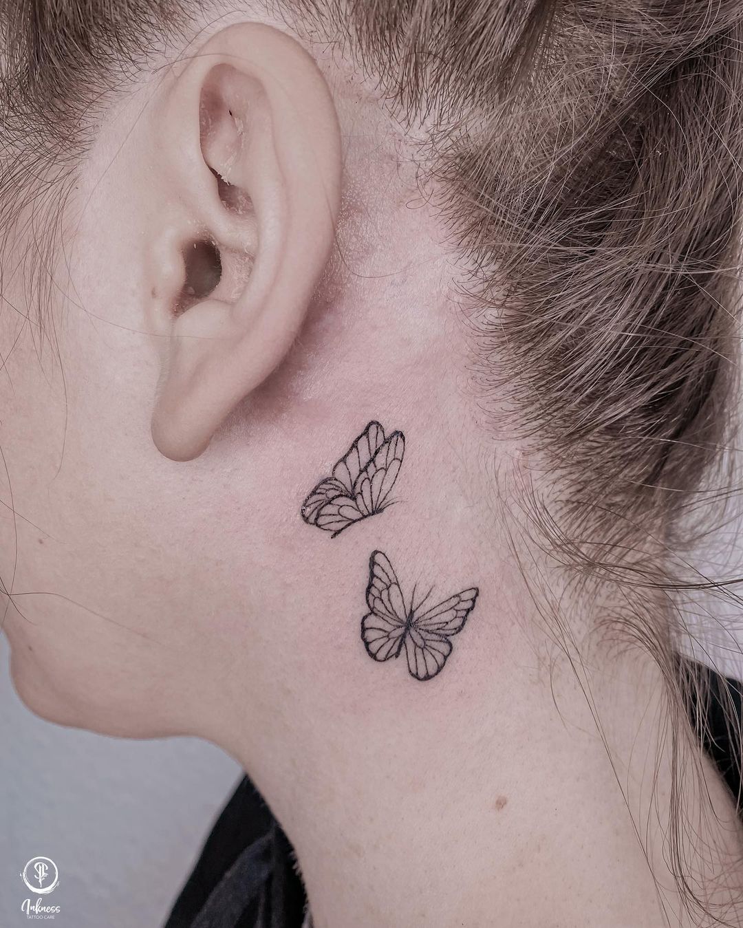 Flying Cute butterfly neck tattoos