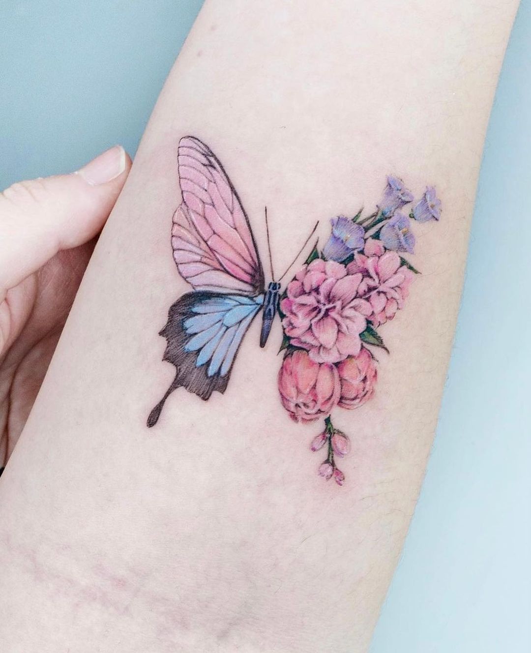 colorful butterfly leg tattoos
