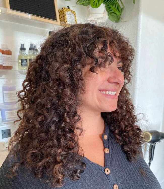 Auburn balayage curly hair
