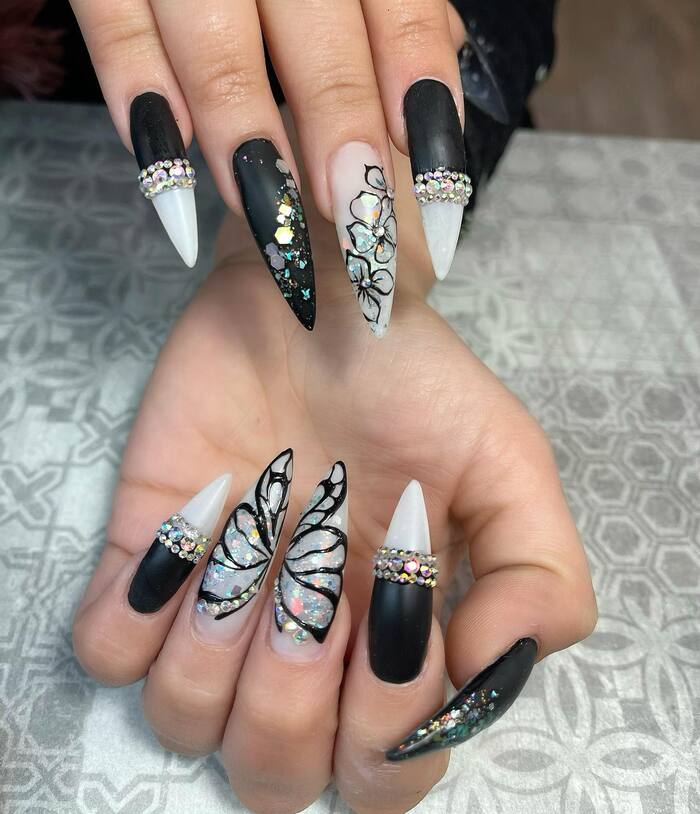 Matte Black Nails With Butterflies Close-Up Image 