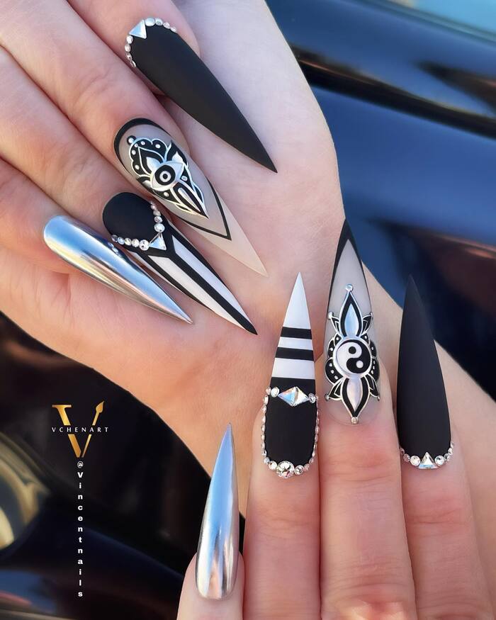 Matte Black And White Stiletto Nails Close-Up Image 