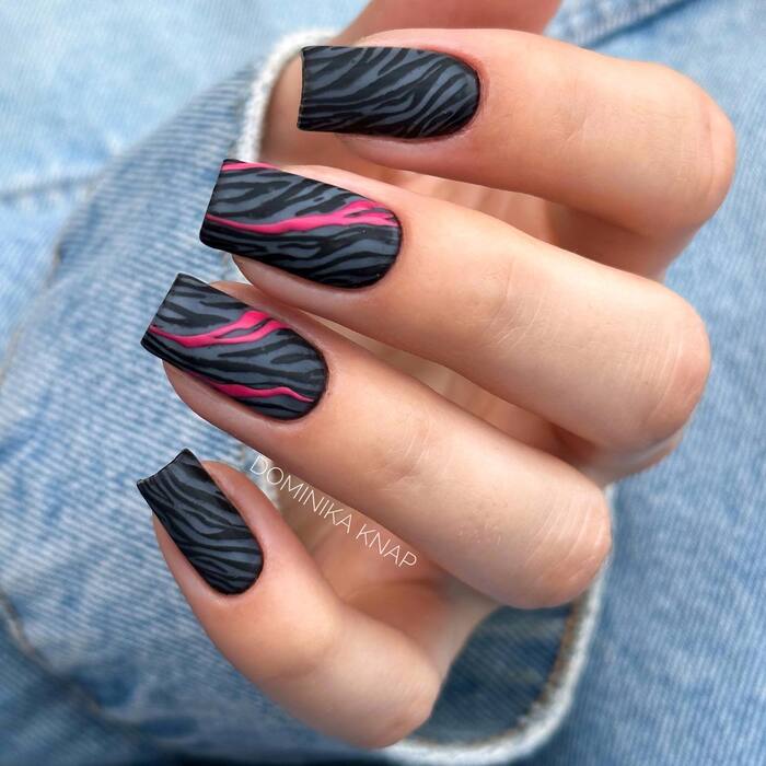 Matte Black And Hot Pink Manicure Close-Up Image 