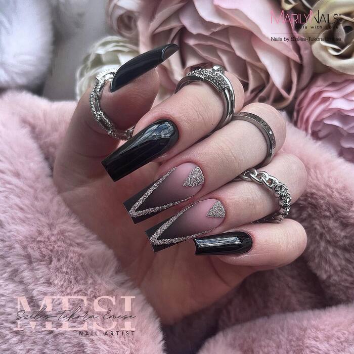 Matte Black Ombre Nails With Designs Close-Up Image 