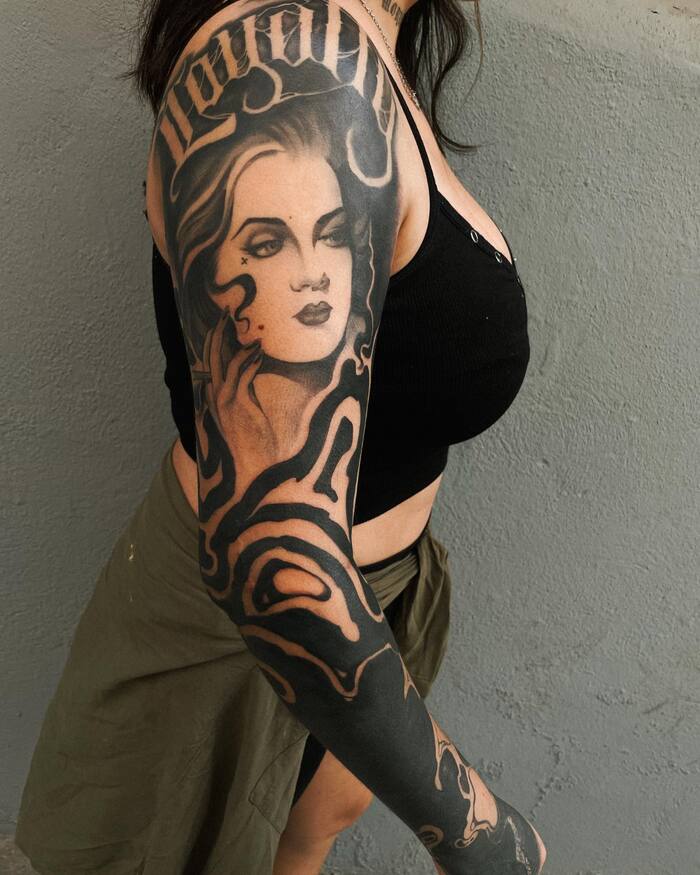Portrait of girl blackout tattoo