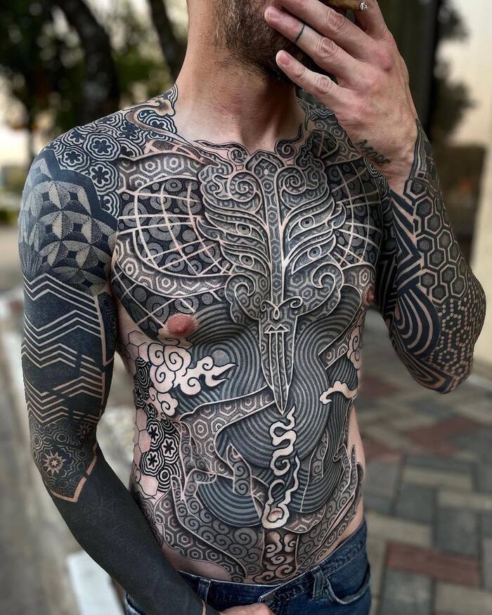 Full body men blackout tattoo with 3d elements 