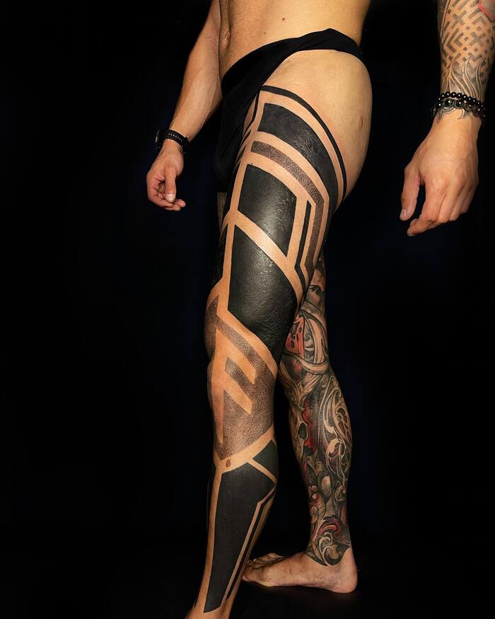 Blackout armor leg tattoo for men