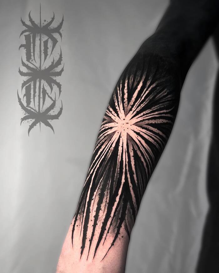 Abstract flower blackout tattoo