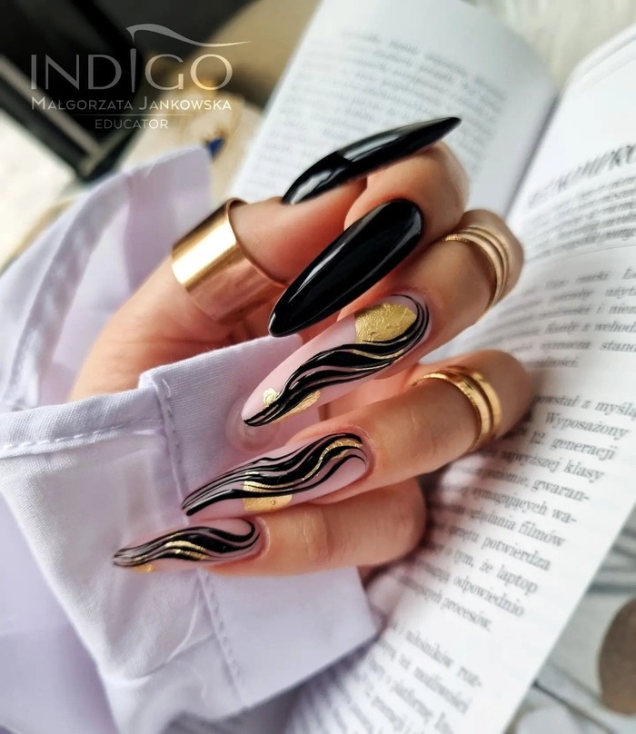 Long almond nails in pink, black and gold