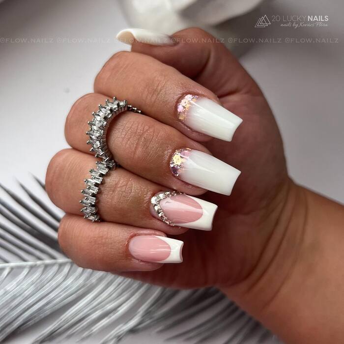 Luxury white and nude wedding nails with diamonds
